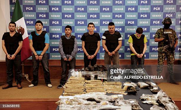Salvador Alfonso Martinez, aka "Ardilla", , alleged member of the Los Zetas Cartel and alleged mastermind of the San Fernando slaugther, is presented...