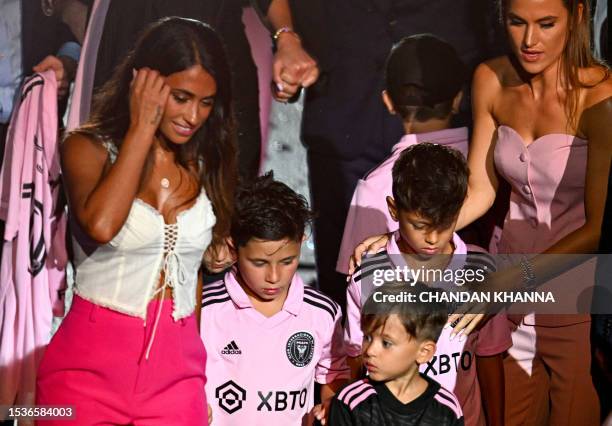 Antonella Roccuzzo with children Thiago Messi, Mateo Messi Roccuzzo and Ciro Messi Roccuzzo attend Argentine soccer star Lionel Messi's being...
