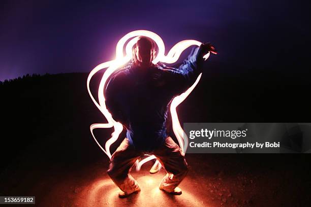 humanoid teapot - light painting stockfoto's en -beelden