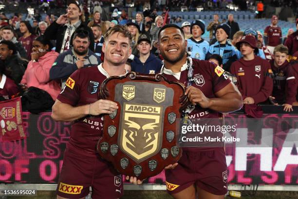 Brimson and Moeaki Fotuaika of the Maroons pose with the State of Origin Shield after winning the series 2-1 after game three of the State of Origin...