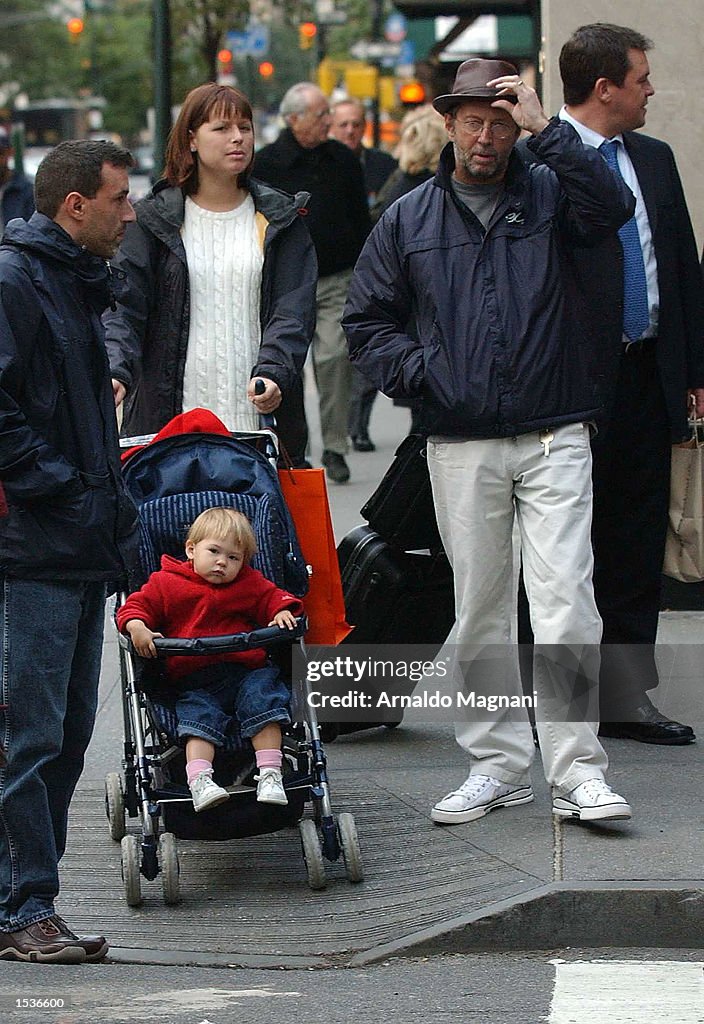 Eric Clapton Walks With His Family In New York