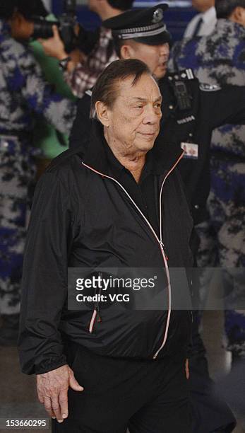 Los Angeles Clippers team owner Donald Sterling arrives at Beijing Capital International Airport before the first leg of the 2012 NBA China games on...
