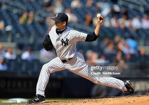 Clay Rapada of the New York Yankees in action against the Toronto Blue Jays at Yankee Stadium on September 19, 2012 in the Bronx borough of New York...