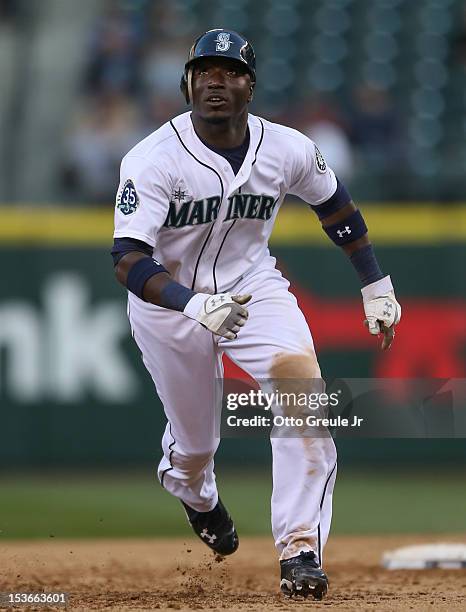 Trayvon Robinson of the Seattle Mariners rounds the bases against the Los Angeles Angels of Anaheim at Safeco Field on October 3, 2012 in Seattle,...