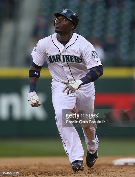Trayvon Robinson of the Seattle Mariners rounds the bases against the Los Angeles Angels of Anaheim at Safeco Field on October 3, 2012 in Seattle,...