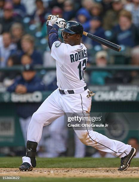 Trayvon Robinson of the Seattle Mariners bats against the Los Angeles Angels of Anaheim at Safeco Field on October 3, 2012 in Seattle, Washington.