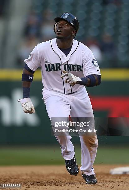 Trayvon Robinson of the Seattle Mariners rounds the bases against the Los Angeles Angels of Anaheim at Safeco Field on October 3, 2012 in Seattle,...