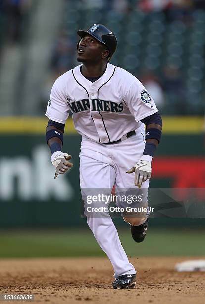 Trayvon Robinson of the Seattle Mariners rounds the bases against the Los Angeles Angels of Anaheim at Safeco Field on October 3, 2012 in Seattle,...