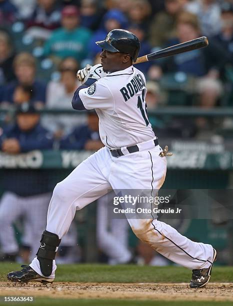 Trayvon Robinson of the Seattle Mariners bats against the Los Angeles Angels of Anaheim at Safeco Field on October 3, 2012 in Seattle, Washington.