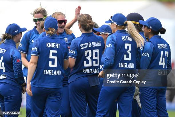 Sophie Ecclestone of England celebrates with teammates after catching out Phoebe Litchfield of Australia during the Women's Ashes 1st We Got Game ODI...