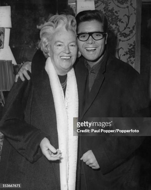 British singers Gracie Fields and Cliff Richard backstage during rehearsals for the Royal Variety Performance at the London Palladium, 2nd November...