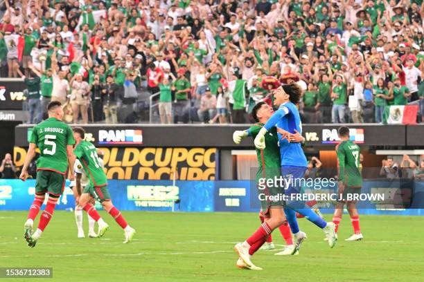 Mexico's goalkeeper Guillermo Ochoa and teammates celebrate after Mexico won the Concacaf 2023 Gold Cup final football match against Panama at SoFi...
