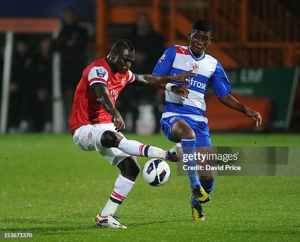 Emmanuel Frimpong of Arsenal challenges Aaron Tshibola of Reading during the Barclays Premier U21 match between Arsenal U21 and Reading U21 at...