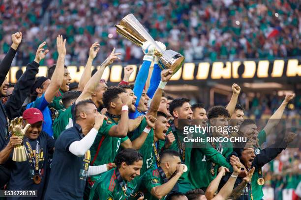 Mexico's players celebrate with the trophy after winning the Concacaf 2023 Gold Cup final football match against Panama at SoFi Stadium in Inglewood,...