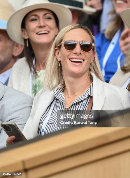 Zara Tindall laughs as she attends day ten of the Wimbledon Tennis Championships at the All England Lawn Tennis and Croquet Club on July 12, 2023 in...