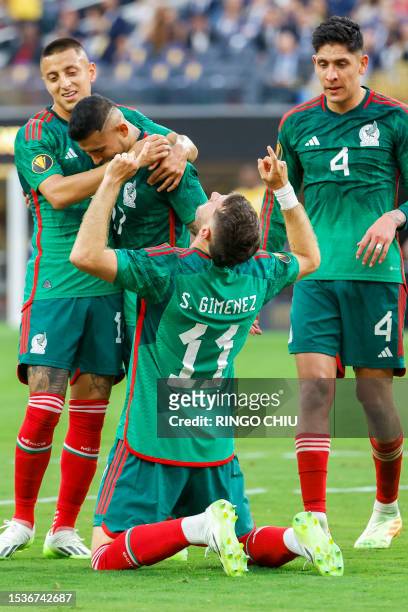 Mexico's forward Santiago Gimenez celebrates after scoring a goal during the Concacaf 2023 Gold Cup final football match between Mexico and Panama at...