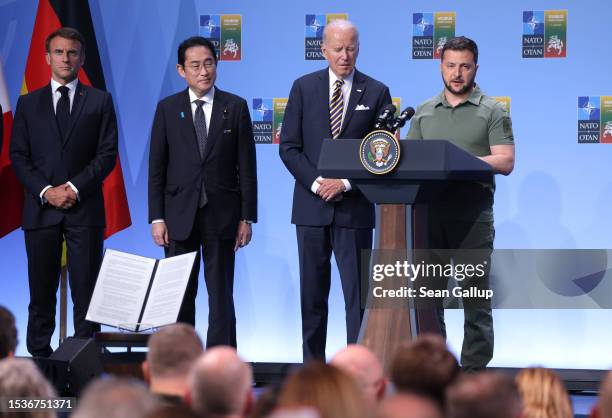 Ukrainian President Volodomyr Zelensky speaks at the announcement of the G7 nations' joint declaration for the support of Ukraine as French President...