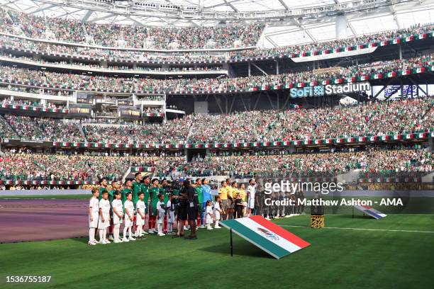The two teams line up in the SoFi Stadium during the Concacaf Gold Cup final match between Mexico and Panama at SoFi Stadium on July 16, 2023 in...