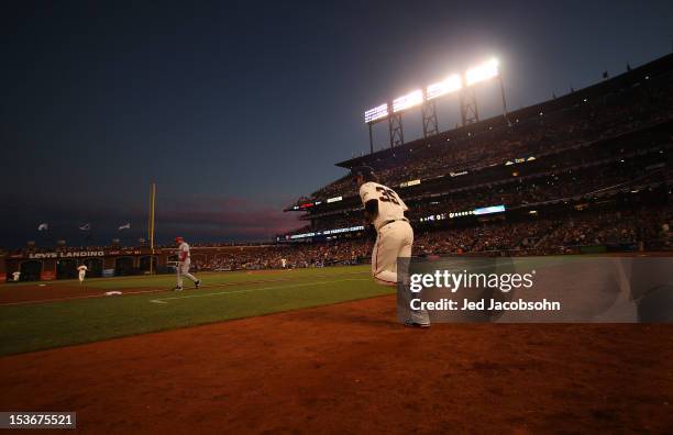 Brandon Crawford of the San Francisco Giants enters the field during Game 2 of the NLDS against the Cincinnati Reds at AT&T Park on Sunday, October...