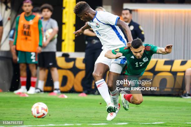 Panama's defender Fidel Escobar vies for the ball with Mexico's midfielder Orbelin Pineda during the Concacaf 2023 Gold Cup final football match...