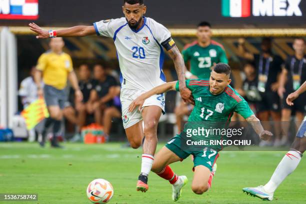 Panama's midfielder Anibal Godoy vies for the ball with Mexico's midfielder Orbelin Pineda during the Concacaf 2023 Gold Cup final football match...