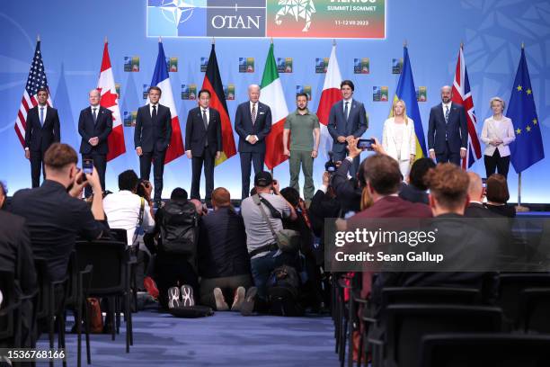 British Prime Minister Rishi Sunak, German Chancellor Olaf Scholz, French President Emmanuel Macron, Japanese Prime Minister Fumio Kishida, U.S....