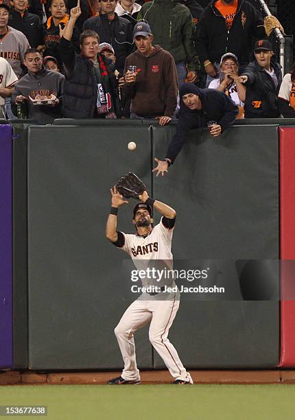 Angel Pagan of the San Francisco Giants catches a ball during Game 2 of the NLDS against the Cincinnati Reds at AT&T Park on Sunday, October 7, 2012...