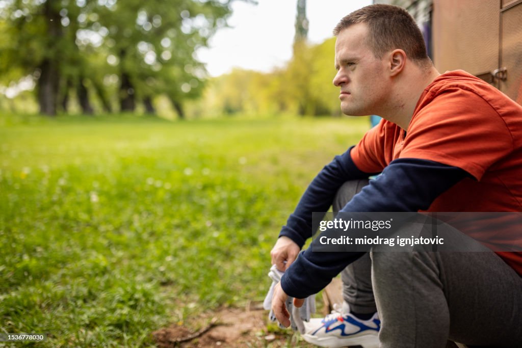 Portrait Of A Man With Down Syndrome High Res Stock Photo Getty Images portrait-of-a-man-with-down-syndrome-high-res-stock-photo-getty-images