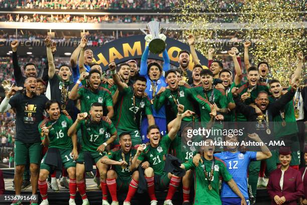 Guillermo Ochoa of Mexico lifts the ONCACAF Gold Cup Trophy after defeating Panama 1-0 during the Concacaf Gold Cup final match between Mexico and...