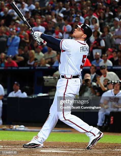 Freddie Freeman of the Atlanta Braves hits against the St. Louis Cardinals during the National League Wild Card Game at Turner Field on October 5,...