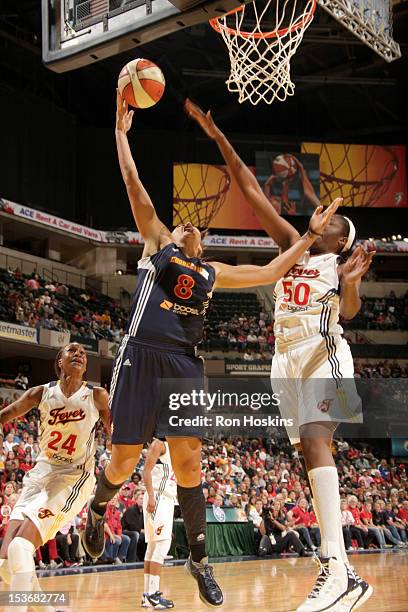 Jessica Davenport of the Indiana Fever defends against Mistie Mims of the Connecticut Sun in Game Two of the East Conference WNBA Finals at Banker's...