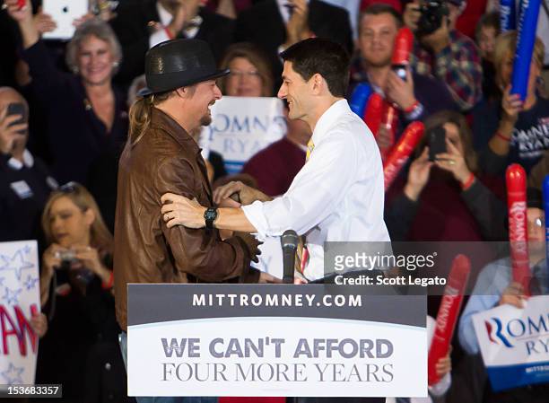 Kid Rock and Congressman Paul Ryan attends the Congressman Paul Ryan Rally With Kid Rock at Oakland University Athletic Center on October 8, 2012 in...