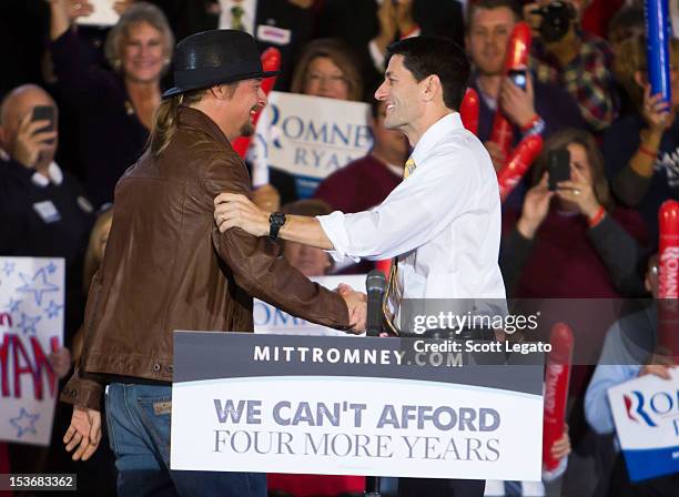 Kid Rock and Congressman Paul Ryan attends the Congressman Paul Ryan Rally With Kid Rock at Oakland University Athletic Center on October 8, 2012 in...