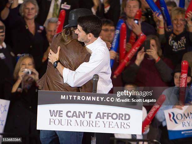 Kid Rock and Congressman Paul Ryan attends the Congressman Paul Ryan Rally With Kid Rock at Oakland University Athletic Center on October 8, 2012 in...