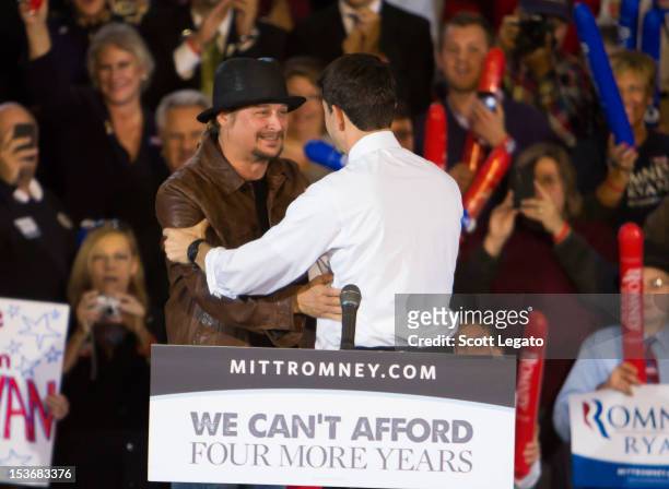 Kid Rock and Congressman Paul Ryan attends the Congressman Paul Ryan Rally With Kid Rock at Oakland University Athletic Center on October 8, 2012 in...