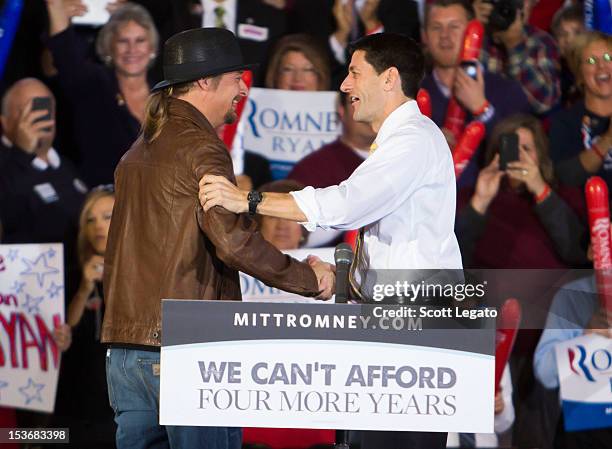 Kid Rock and Congressman Paul Ryan attends the Congressman Paul Ryan Rally With Kid Rock at Oakland University Athletic Center on October 8, 2012 in...