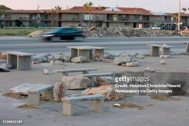 Boulders are scattered among the benches along the sea wall in Galveston. The beach along the seawall in Galveston is much narrower and some hazards...