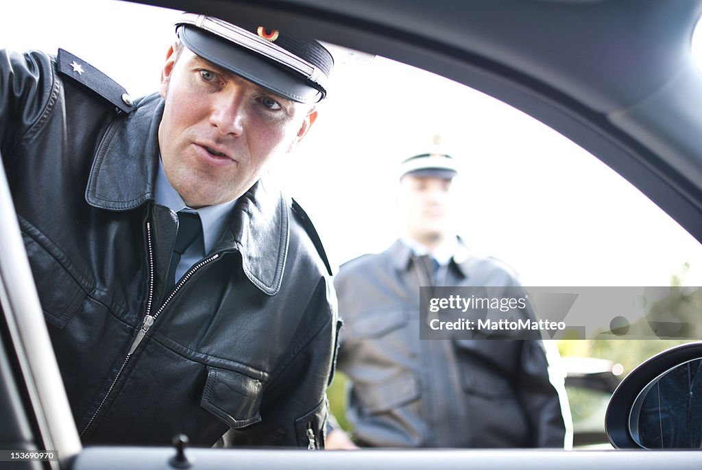 Two police officers doing a traffic control