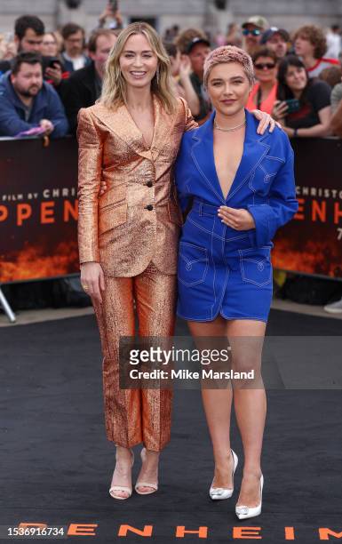 Emily Blunt and Florence Pugh attend a photocall for "Oppenheimer" at Trafalgar Square on July 12, 2023 in London, England.