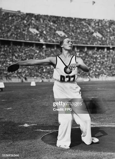 German athlete Gisela Mauermayer competes in the women's discus throw at the 1936 Summer Olympics, held at the Olympiastadion in Berlin, Germany, 4th...