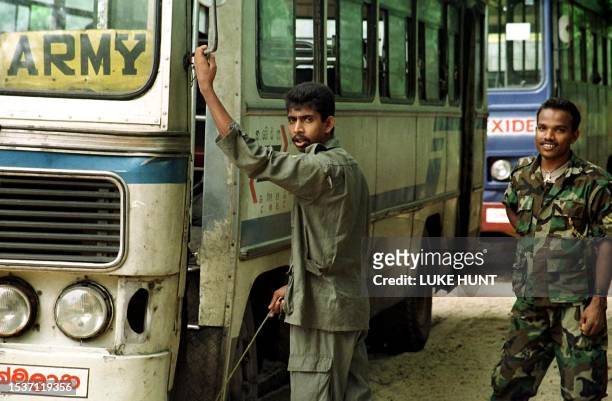 New recruit gears-up for Sri Lanka's frontlines in Jaffna, 02 June 2000 in Trincomalee, where separatist Tamil Tigers who are fighting for an...