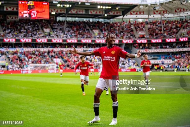 Noam Emeran of Manchester United celebrates after scoring their sides first goal during the Pre-Season Friendly match between Manchester United and...