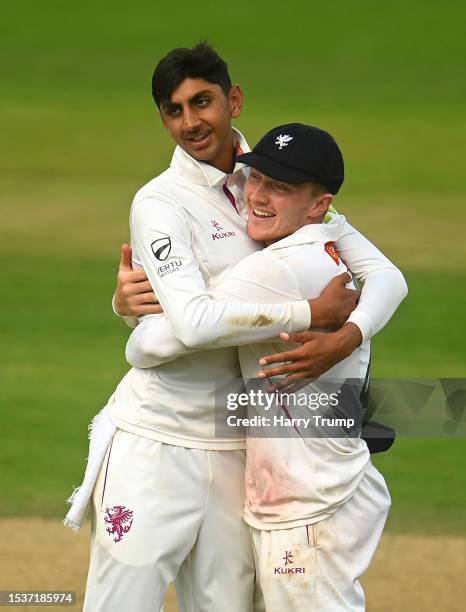 Shoaib Bashir of Somerset celebrates the wicket of Felix Organ of Hampshire with team mate Dom Bess during Day Three of the LV= Insurance County...