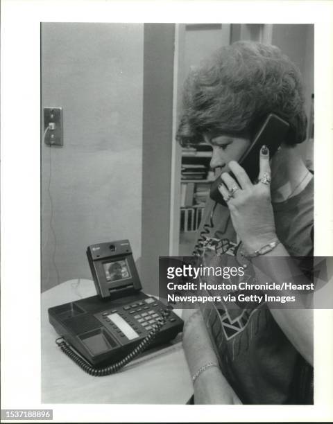 Greenspoint Mall shopper Lois Medlen of Ocean Springs, Mississippi, uses a Videophone on Friday to talk to an American Telephone & Telegraph employee...