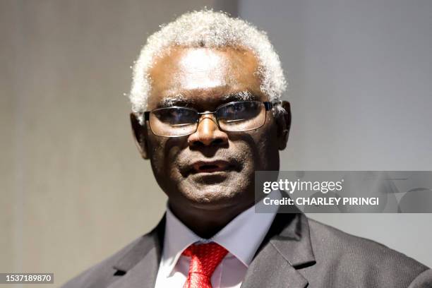 Solomon Islands' Prime Minister Maanasseh Sogavare speaks at a press conference in Honiara on July 17 after returning home from a seven-day trip to...