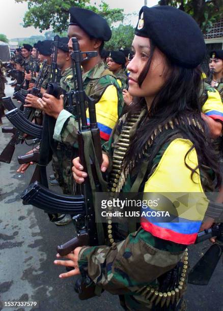 Soldiers of the Revolutionary Armed Forces of Colombia take part in a military parade in San Vicente del Caguan, Caqueta, Colombia, 01 February 2001....