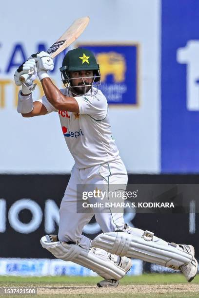 Pakistan's Saud Shakeel plays a shot during the second day of the first cricket Test match between Sri Lanka and Pakistan at the Galle International...