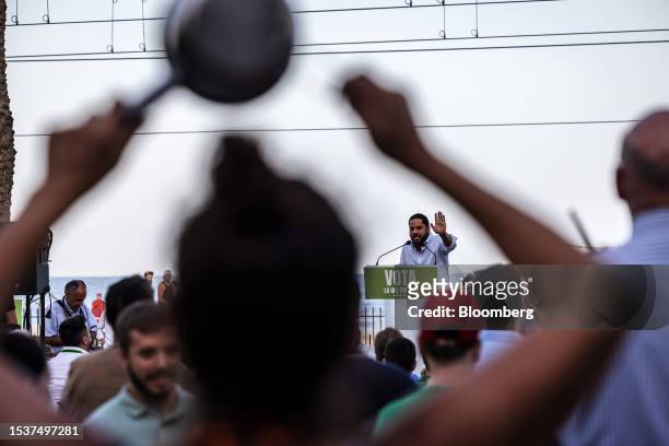 Residents bang pots and pans to protest against the far-right group Vox during a campaign event at Rambla de Badalona in Badalona, Spain, on Sunday,...