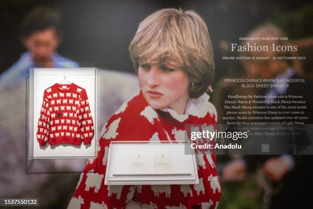 July 17: The late Princess Dianaâs historic black sheep jumper is on display at Sothebyâs auction house with a sale estimate of Â£40,000-70,000 in...
