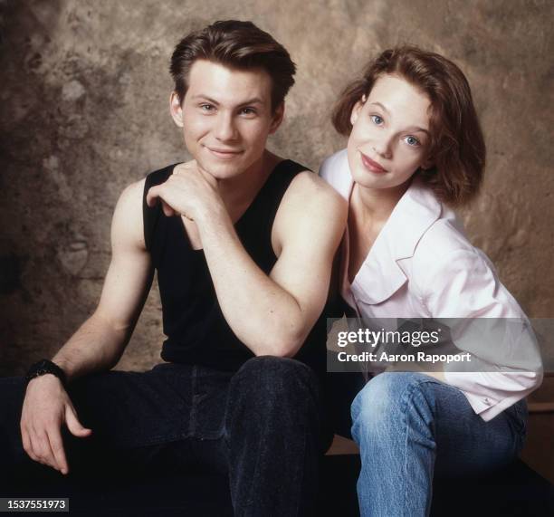 Actors Christian Slater and Samantha Mathis pose for a portrait for the film Pump Up The Volume in Los Angeles, California.